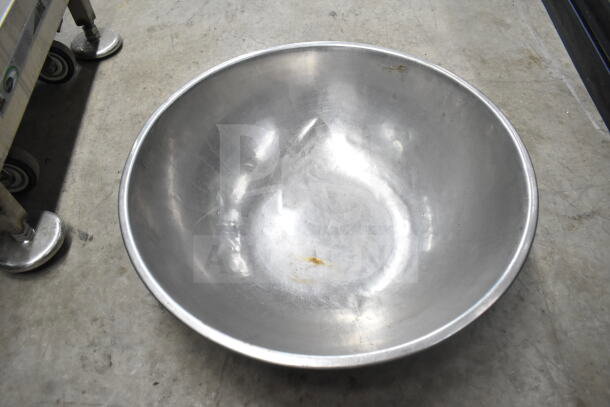 Large metal bowl with visible wear marks, part of auction lot with colander, stock pot, china cap strainer, air pot, and scale.