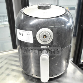 Dash DFAF460GBBK01 Air Fryer, black, 120 volts, visible timer dial, label with "100 QTY". Good condition.