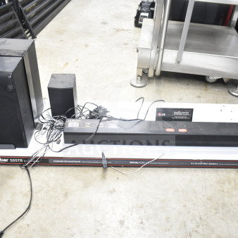 LG Soundbar S55TR store display with sound bar and speakers, showing wires and connectivity options, in good condition.