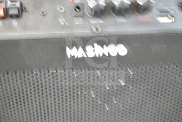 Masingo Soprano X1 Karaoke Machine, features aux input, mic volume, echo settings, USB/TF card slots, in good condition.