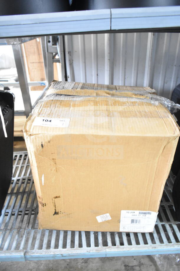Brown cardboard box labeled "Cal-Mil 3605-13" on metal shelf, slight wear visible, sealed with packing tape.