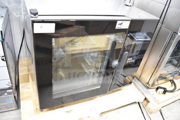 Brand new Blodgett 61BE INVOQ Hybrid combi convection oven, electric, 208V, 3-phase. Minor scratches; visible unit tags.