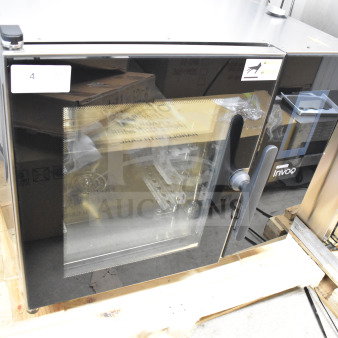Brand new Blodgett 61BE INVOQ Hybrid combi convection oven, electric, 208V, 3-phase. Minor scratches; visible unit tags.