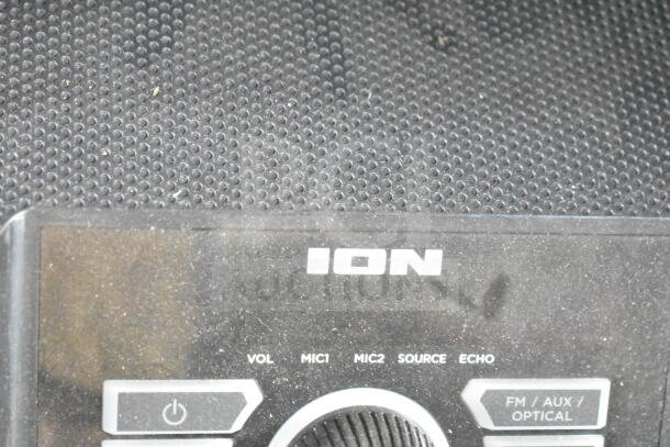 Ion MK2 Party Rocker Max Karaoke Machine control panel showing volume and input options; slight wear visible.