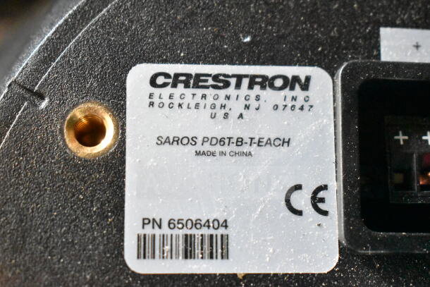 Crestron Saros PD6T-B-T-EACH speaker label showing model, made in China, PN 6506404. Auction includes 11 speakers.