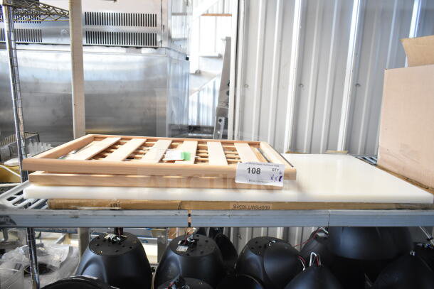 Brand new AvaValley wood shelf and Regency poly table top on a metal rack. Tag reads "108 QTY 6."