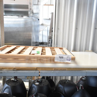 Brand new AvaValley wood shelf and Regency poly table top on a metal rack. Tag reads "108 QTY 6."
