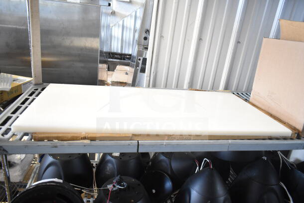 6 brand new scratch and dent items including AvaValley and Regency components, visible boxed tabletop on shelf.