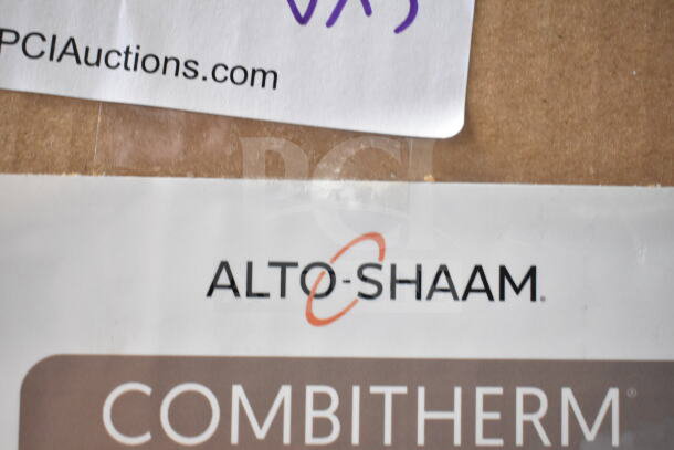Package with Alto Shaam Combitherm label, indicating new scratch and dent items. Includes Hobart contactor, water tablets, and drip tray.