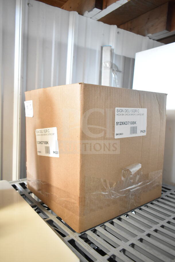 Cardboard box containing new deli tags, model 512XKD710BK, with black checkered border, 25 per pack.