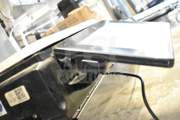 2016 Hobart HTi-7LH Commercial Scale, black, countertop model in working condition with visible digital screen.