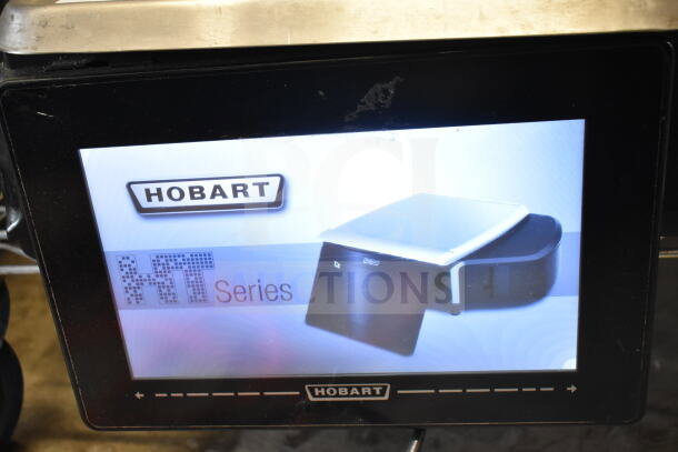 2016 Hobart HTi-7LH commercial food portioning scale, in tested working condition, showing digital display.