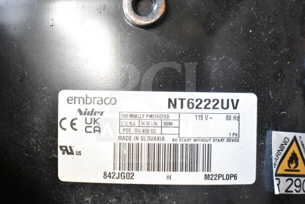 Embraco NT6222UV compressor, 115V, 1-phase, thermally protected, made in Slovakia, label with specifications visible.