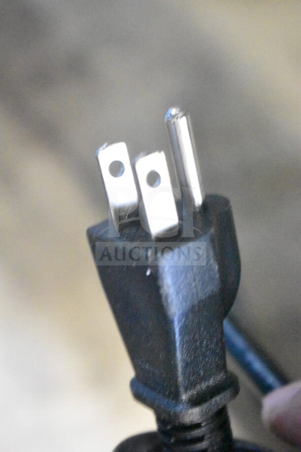 Close-up of a three-prong plug for the Galaxy 177RCSGB60 rice cooker, showcasing electrical connectivity features.