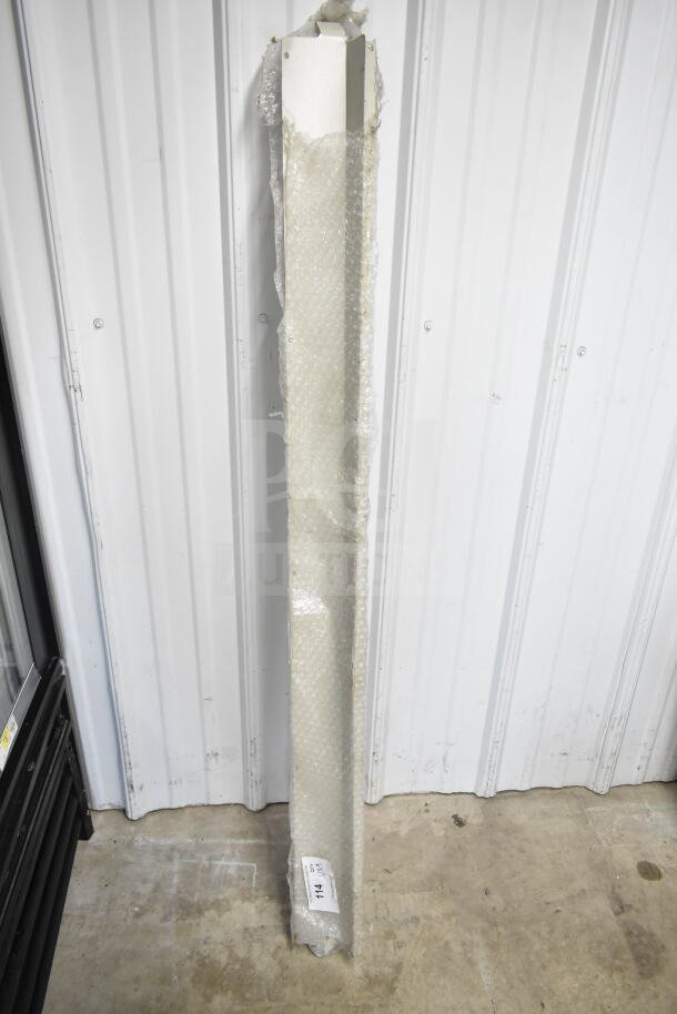 9 various items including metal legs and panels, in protective bubble wrap. Auction lot tag visible, indicating "Lot 144".