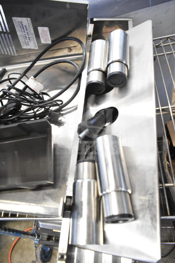 Set of 9 various items including metal legs and panels, features visible cords and mounting hardware, industrial grade.