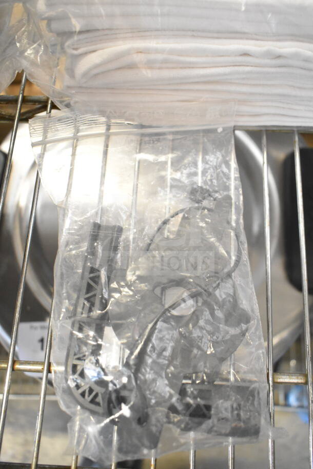 5 various items including 42655.0007 Faucet Kit, Drop In Bin, and 167704FSTW Flour Sack Towels, sealed in bags.
