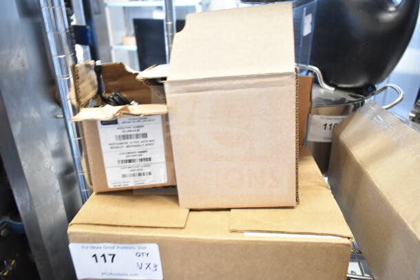 3 various items including a Wren camera and SVW PTZ adapter, in cardboard boxes, showing labels and item codes.