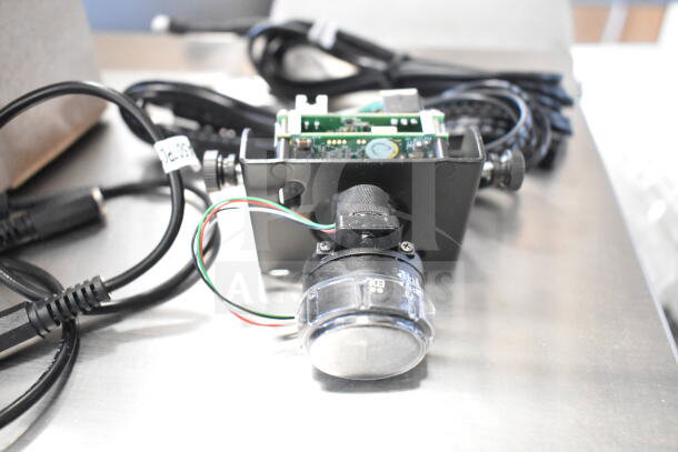 Three items including a Wren camera and SVW PTZ adapter with cables. Good condition, includes visible tags.