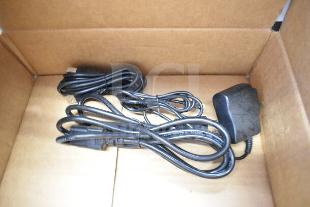 Box with black power cables and adapter, part of auction lot including Wren Camera, SVW PTZ Adapter.