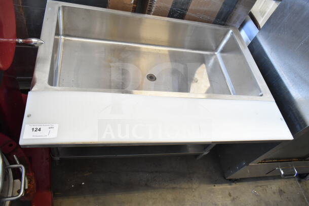 Commercial steam table with under shelf, stainless steel, single-basin, visible shelf, good condition, auction tag.