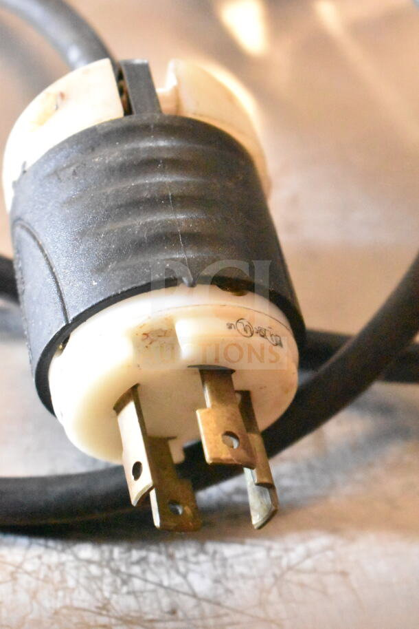 Plug of Attias USA 60 commercial dough mixer, showing three-prong design for 208V, 3-phase connection.