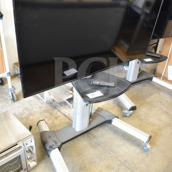 Samsung UN50NU6900B 50" TV on rolling cart. Requires 110-120V, 1 phase. Buyer must pick up. Item includes remote.