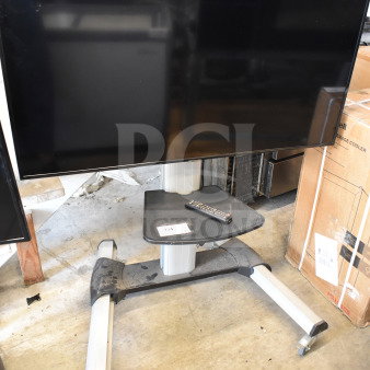 Samsung UN50NU6900B 50" TV on wheeled cart. Includes remote. 110-120V, 1 phase. Local pick-up only, no shipping.