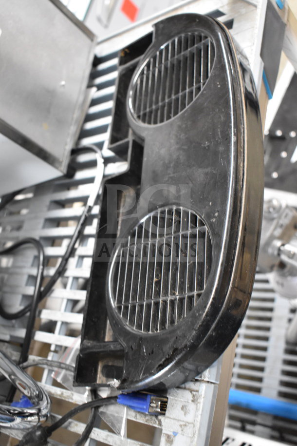 Black drip tray for slushie machine, dual grid design. Used condition. Includes two machine hoppers.