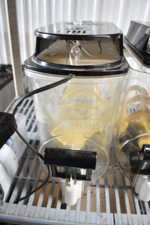 3 slushie machine hoppers with drip tray, clear plastic with black lids, used condition.