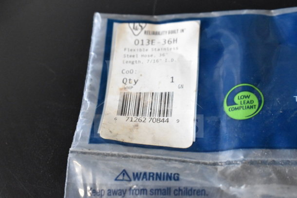 T&S 013E-36H water hose packaging, 36" flexible stainless steel, 7/16" I.D., low lead compliant label visible.