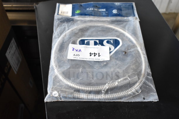 T&S 013E-36H water hose, new in package, stainless steel, flex design, with visible brand and item label.