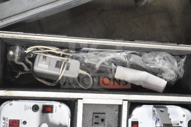 Rockville hard case containing 8 Best Par 50 rechargeable par cans. Includes power cables and accessories. Good condition.
