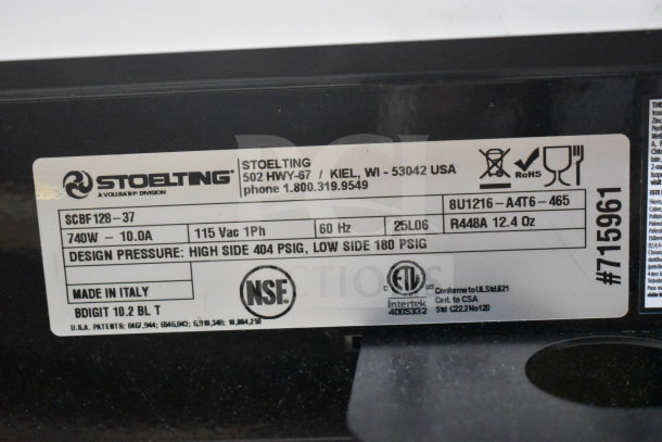 Stoelting SCBF128-37 commercial frozen drink machine label showing model, voltage, design pressure, and certifications.