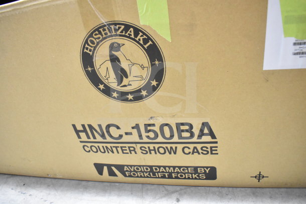 Cardboard box for Hoshizaki HNC-150BA sushi display case, showing logo and "Avoid Damage by Forklift Forks" warning.
