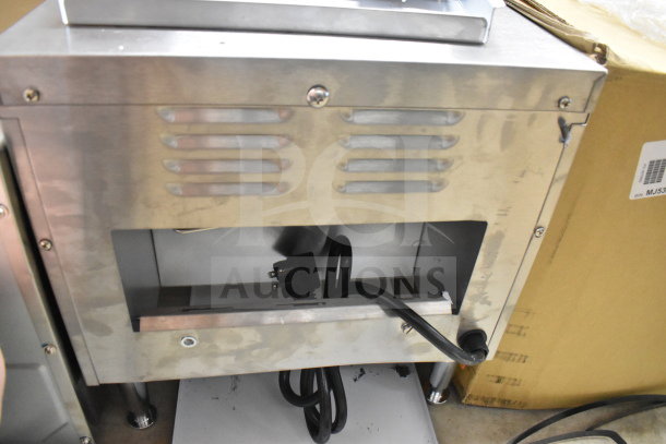 Avantco countertop conveyor pizza oven in stainless steel, power cord visible, showing minor surface wear, ideal for restaurant use.