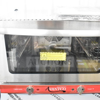 Brand new Avantco 177CO16 half-size convection oven, 1.5 Cu. Ft., 120V, minor cosmetic scratches, caution label visible.