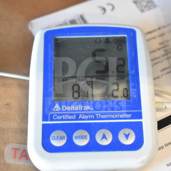 DeltaTrak certified alarm thermometer displaying temperature. Includes Curtis spigots and drip tray. Bid multiplies x3.