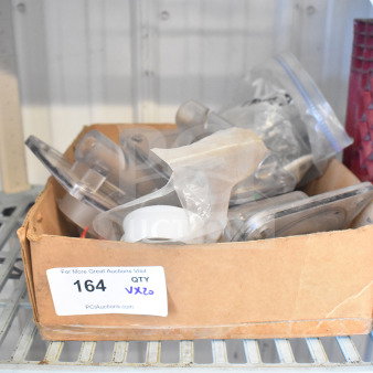 Cardboard box containing various Flavor Burst machine parts and other items, lot label "164 QTY VX20".