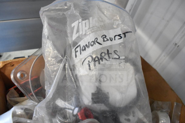 Bag of Flavor Burst machine parts labeled "Flavor Burst Parts," containing various items, in used condition.
