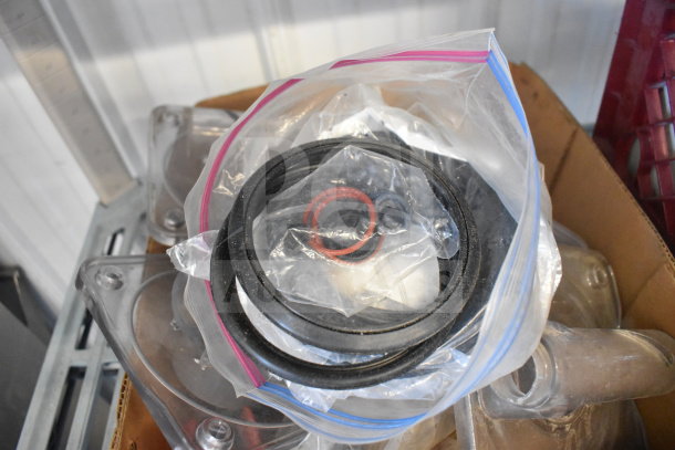 Bag containing various Flavor Burst machine parts, including gaskets, in good condition.