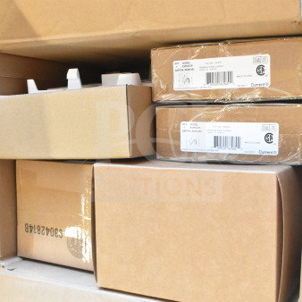 Box of various items including Dual Lite EVHCEZP emergency light back box and Dual Lite double remote head, new in packaging.