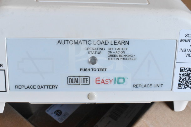 Dual Lite EVHCEZP emergency light back box with EasyID automatic load learn panel, featuring status indicators.