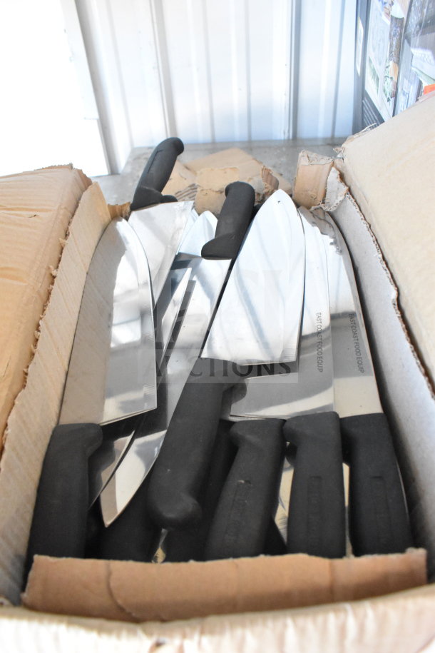 Box of 70 sharpened stainless steel chef knives with black handles, marked "EISCO INST FOOD EQUIP," in excellent condition.