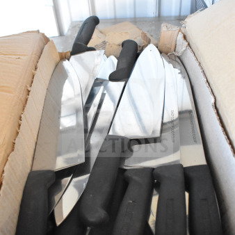 Box of 70 sharpened stainless steel chef knives with black handles, marked "EISCO INST FOOD EQUIP," in excellent condition.