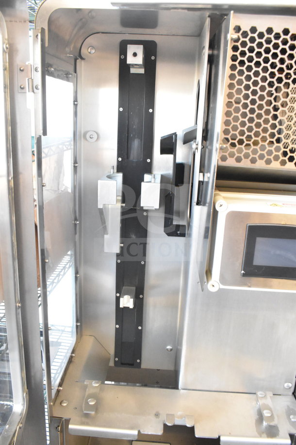 LATE MODEL JBT 2ND-GEN-MFJ-HE citrus juicer, stainless steel, commercial floor style, missing back left caster, 115V.