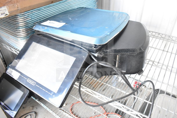 2023 Hobart HTi-7LH4W commercial food portioning scale, tested and working, on metal shelf. Model tag visible.