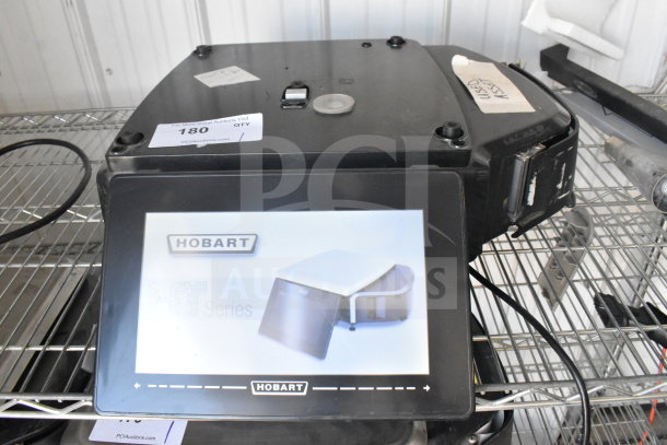 2020 Hobart HTi-LH4W food portioning scale, tested and working; 120/208-240V, 1 Phase, black with display screen.