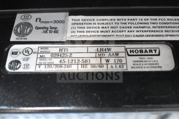 Hobart HTi-LH4W commercial scale label showing model, voltage (120/208-240V), serial, and compliance details. Tested and working.