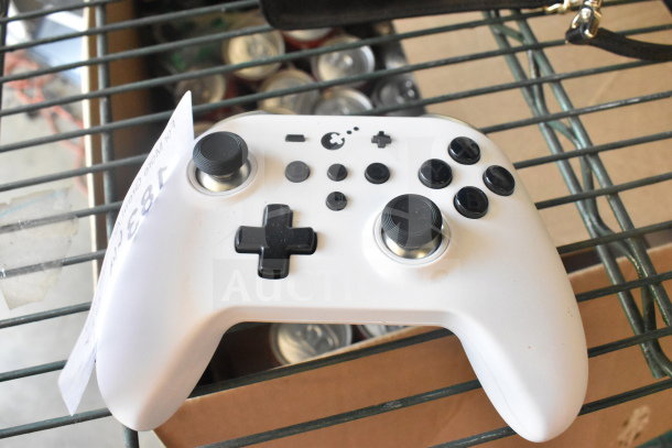 Xbox Zen Pro Controller, white, dual analog sticks, D-pad, buttons intact, in good condition, auction label attached.